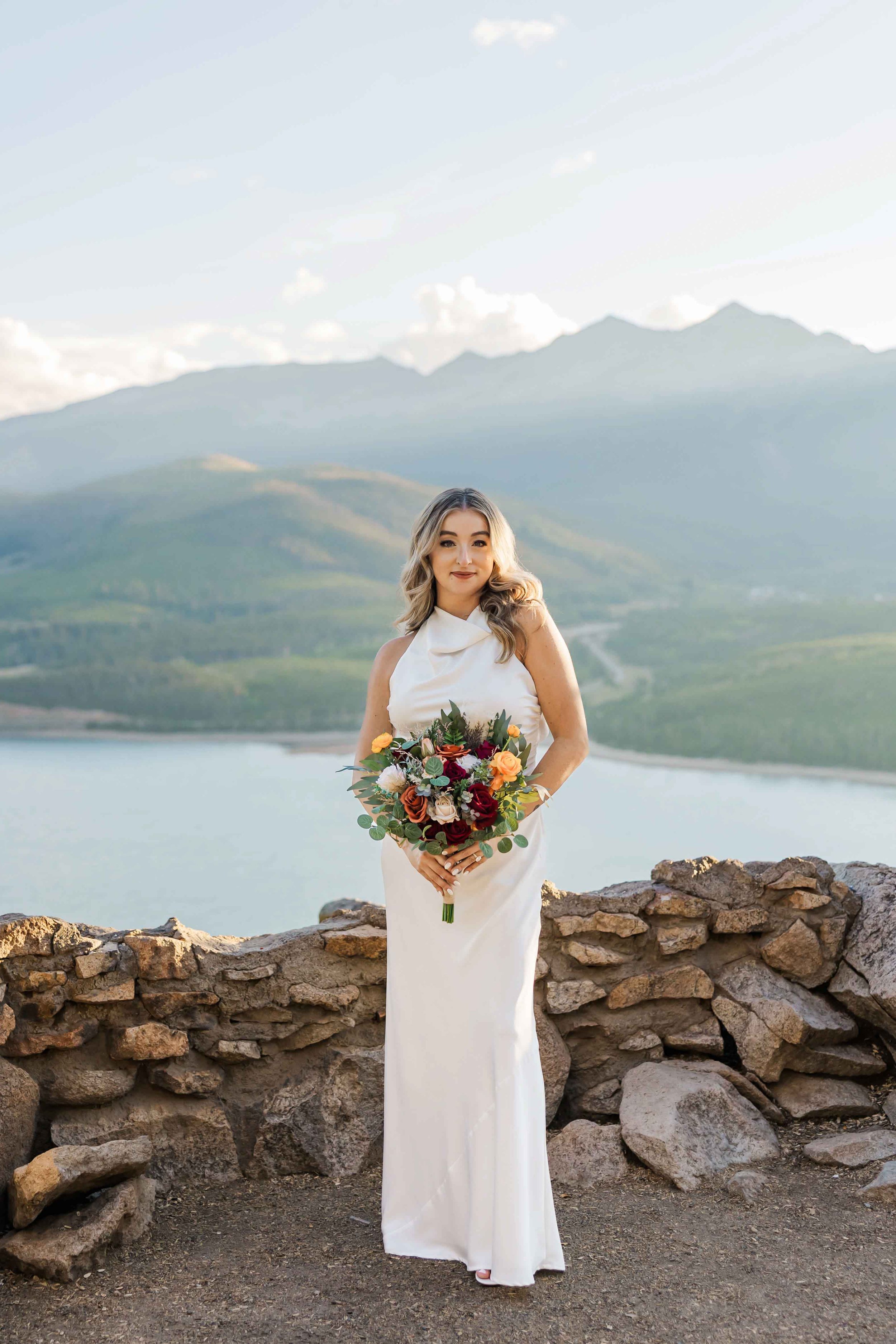 31-bride-stands-on-sapphire-point-overlook-following-outdoor-micro-wedding-ceremony.jpg