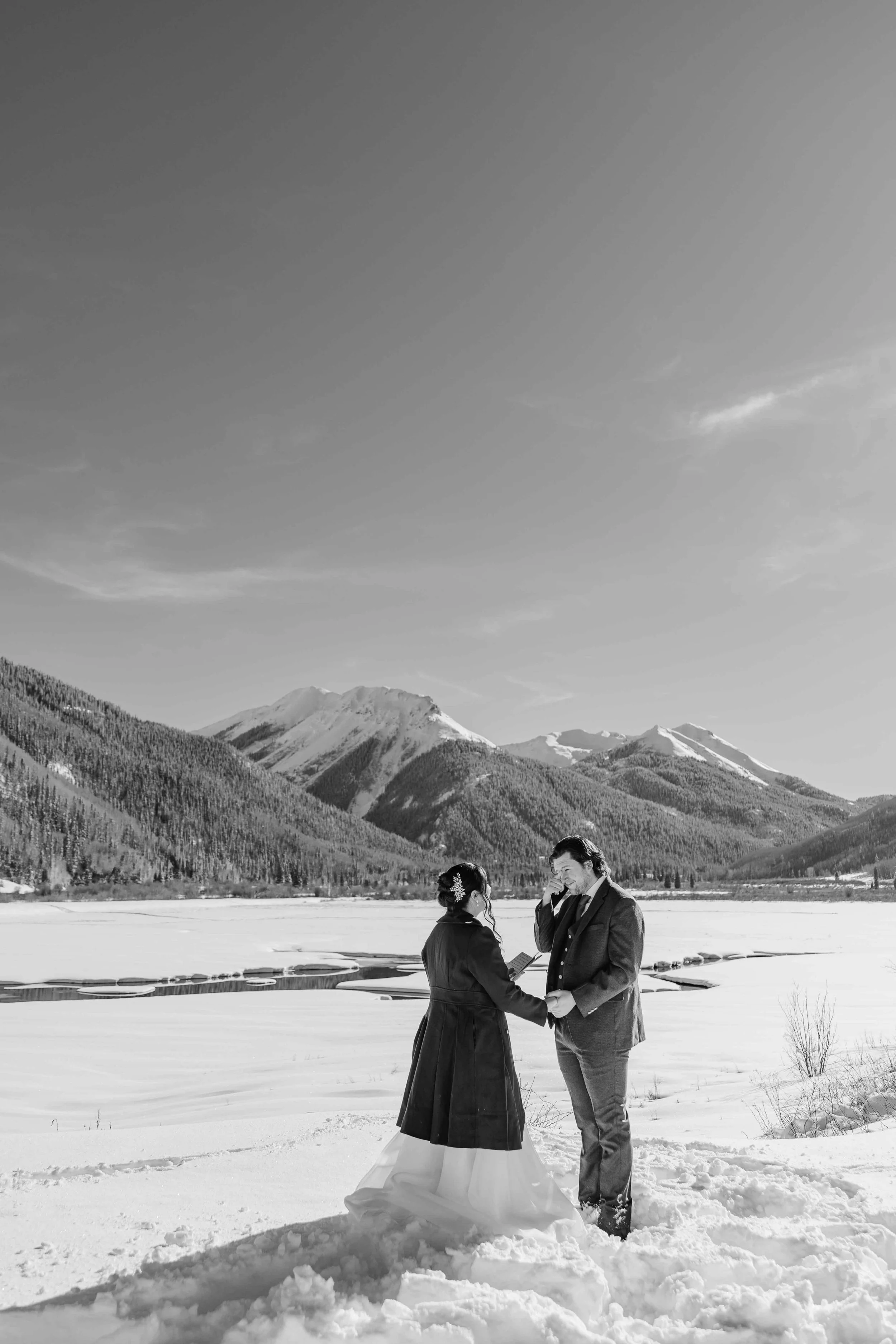 09_bride-and-groom-share-vows-san-juan-mountains.jpg