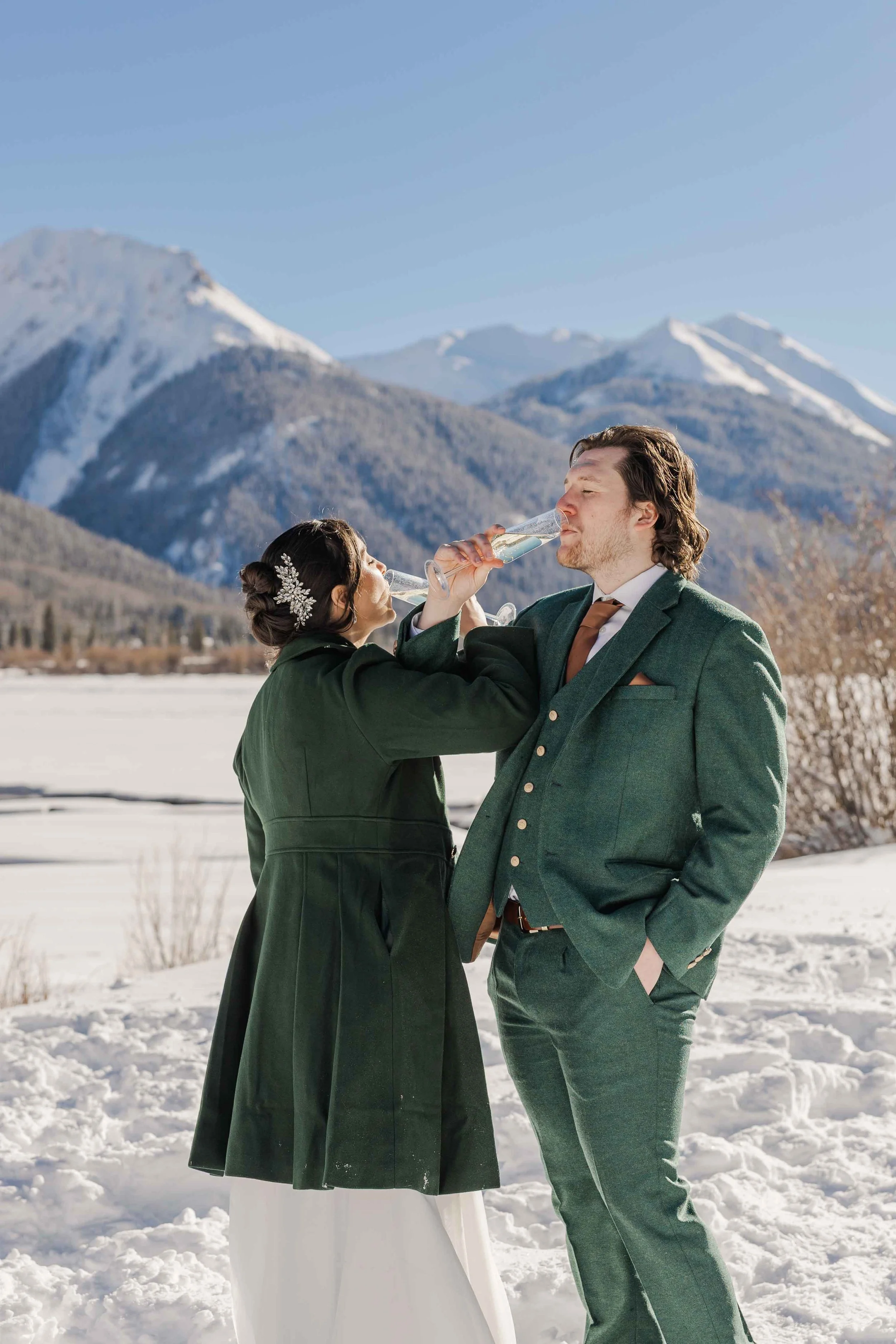 34_colorado-elopement-couple-celebrates-with-champagne-after-ceremony.jpg