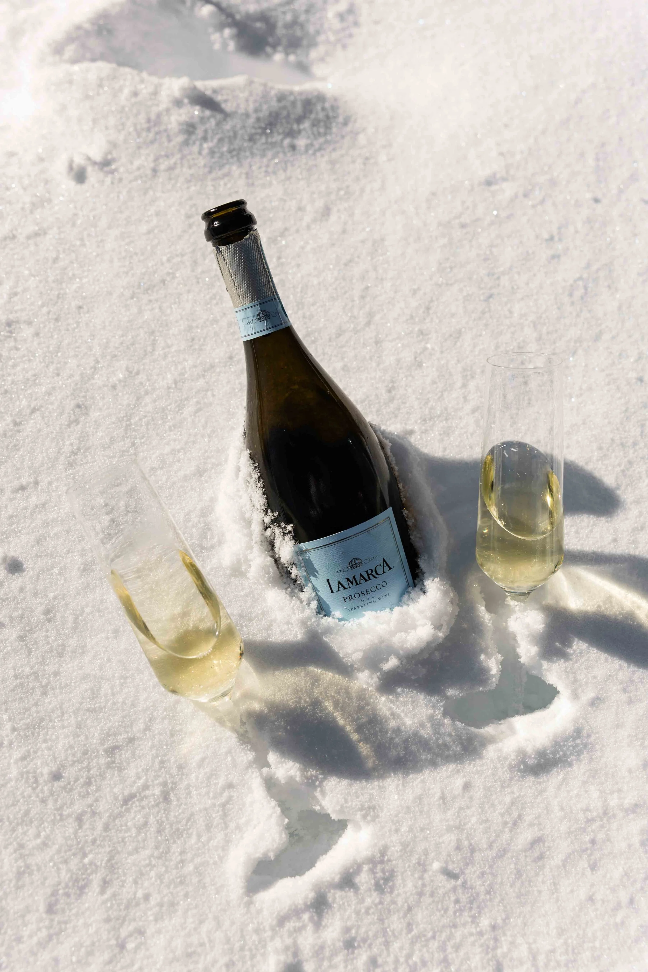 36_wedding-day-champagne-in-snow-on-mountains-in-colorado.jpg