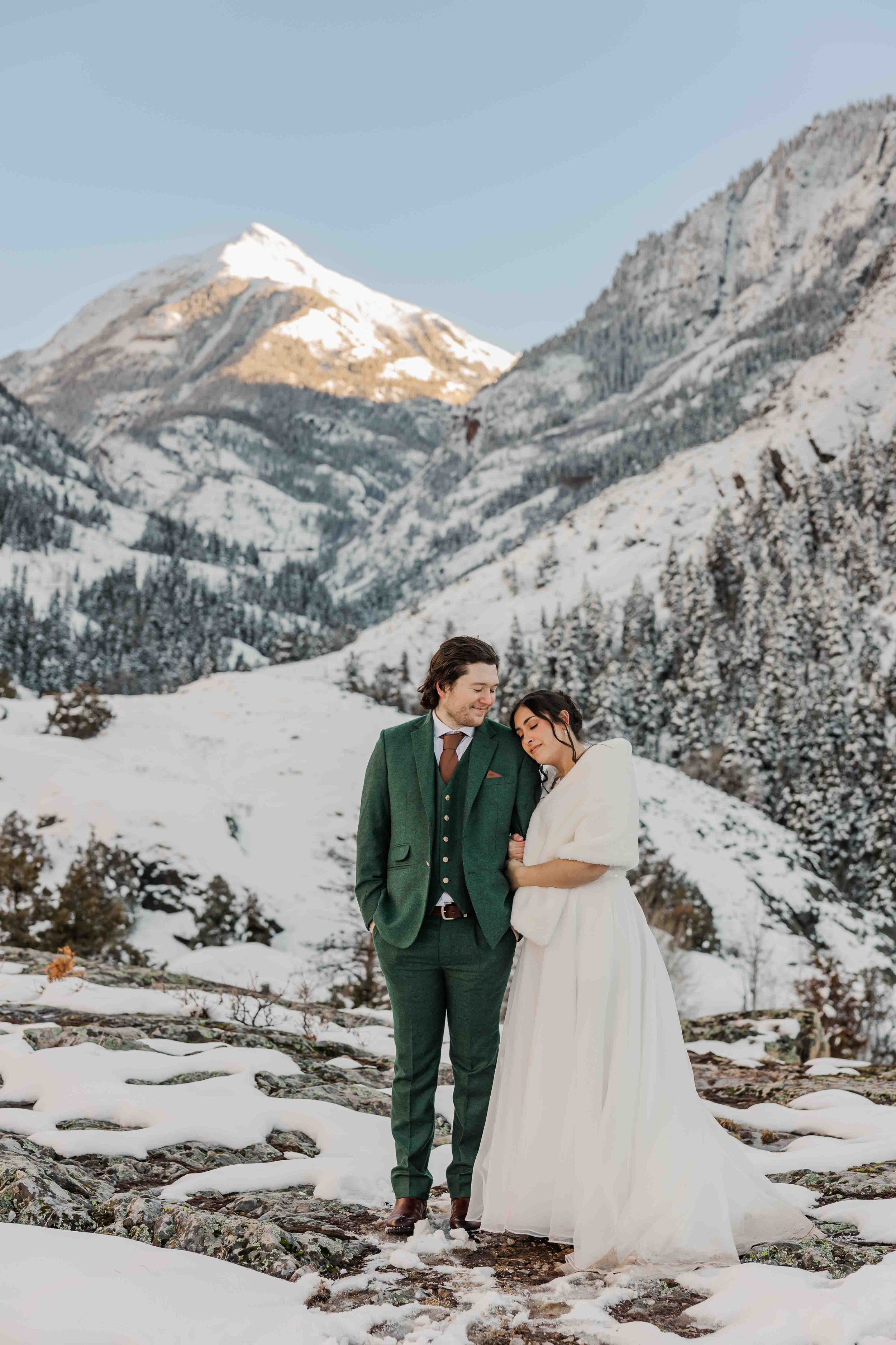 46_bride-and-groom-pose-for-portraits-in-san-juan-mountains.jpg