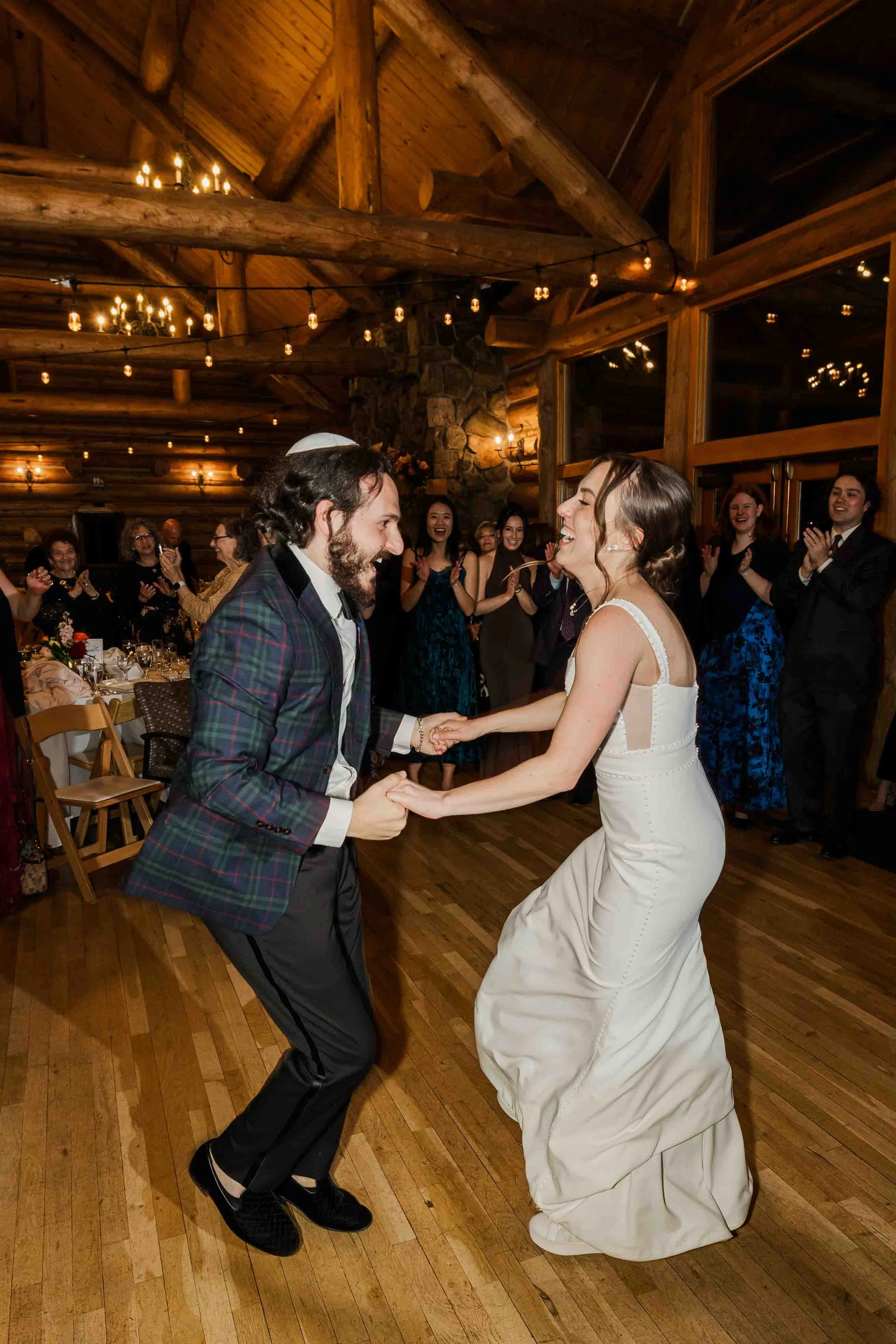 55_bride-and-groom-dance-at-wedding-reception-evergreen-lakehouse.jpg