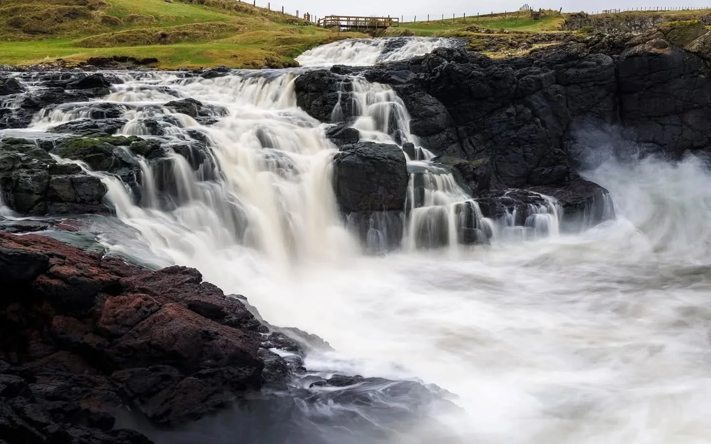 Where fresh water falls into the sea. 

Lovely to see so much water flowing at Dunseverick, although it's an indicator of all the rain there's been!