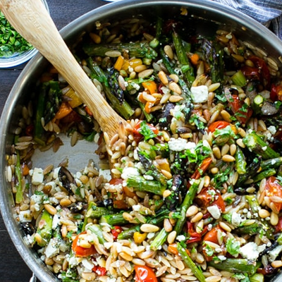 ASPARAGUS MUSHROOM ORZO. The amount of steam this creates in the oven is actually concerning lol. Definitely split between 2 sheet pans to properly char the veg.