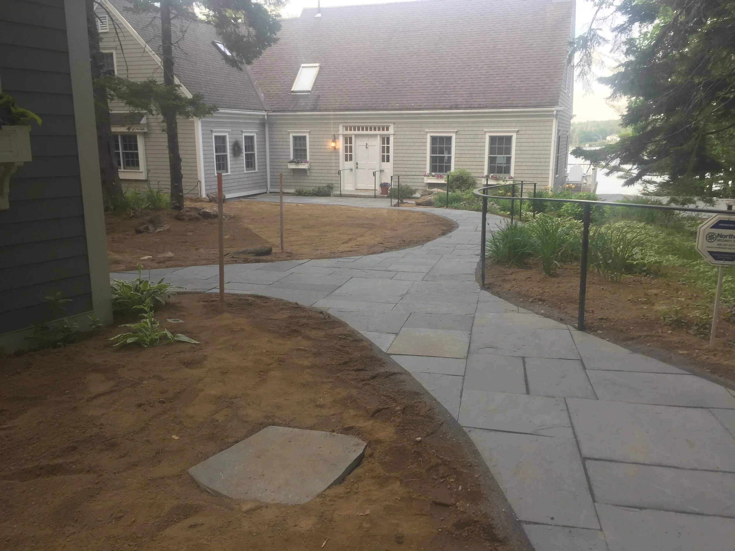 y shaped blue stone walk way 