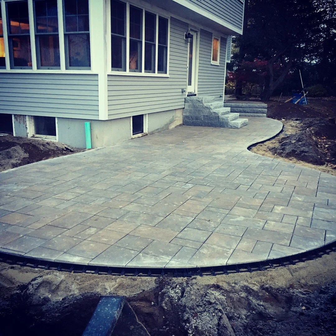 patio and walk way with rough granite steps