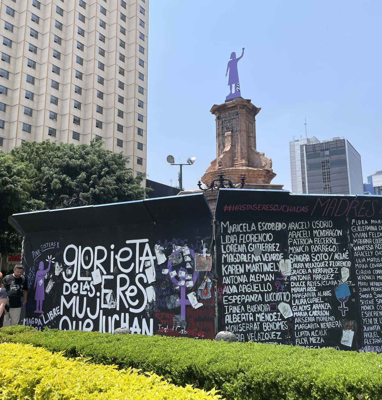   Feminist activists planted this wooden, purple representation of a woman with the cry “Justicia” on her back. On its base are the names of women who have fought for their rights.  