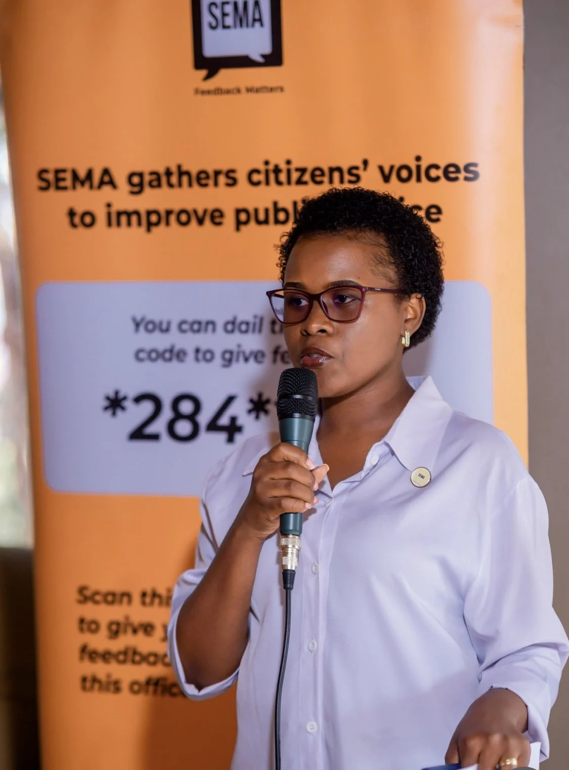 SEMA team lead speaking at community engagement (1).jpg