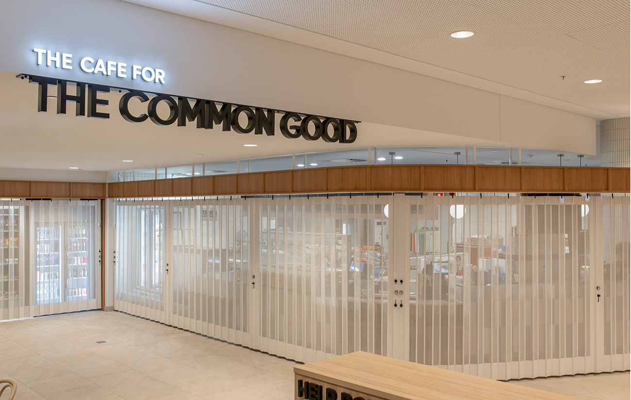 Prince Charles Hospital Foundation Common Good Cafe. Front view of The Cafe for the Common Good, a closed cafe with a white facade. Food and beverage Interior Design Brisbane Australia