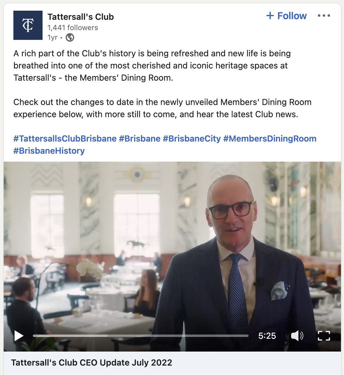 Tattersall's Club CEO update video showing a man in a suit standing in the Members' Dining Room, with tables and people in the background. Restaurant Interior Designers in Brisbane Australia