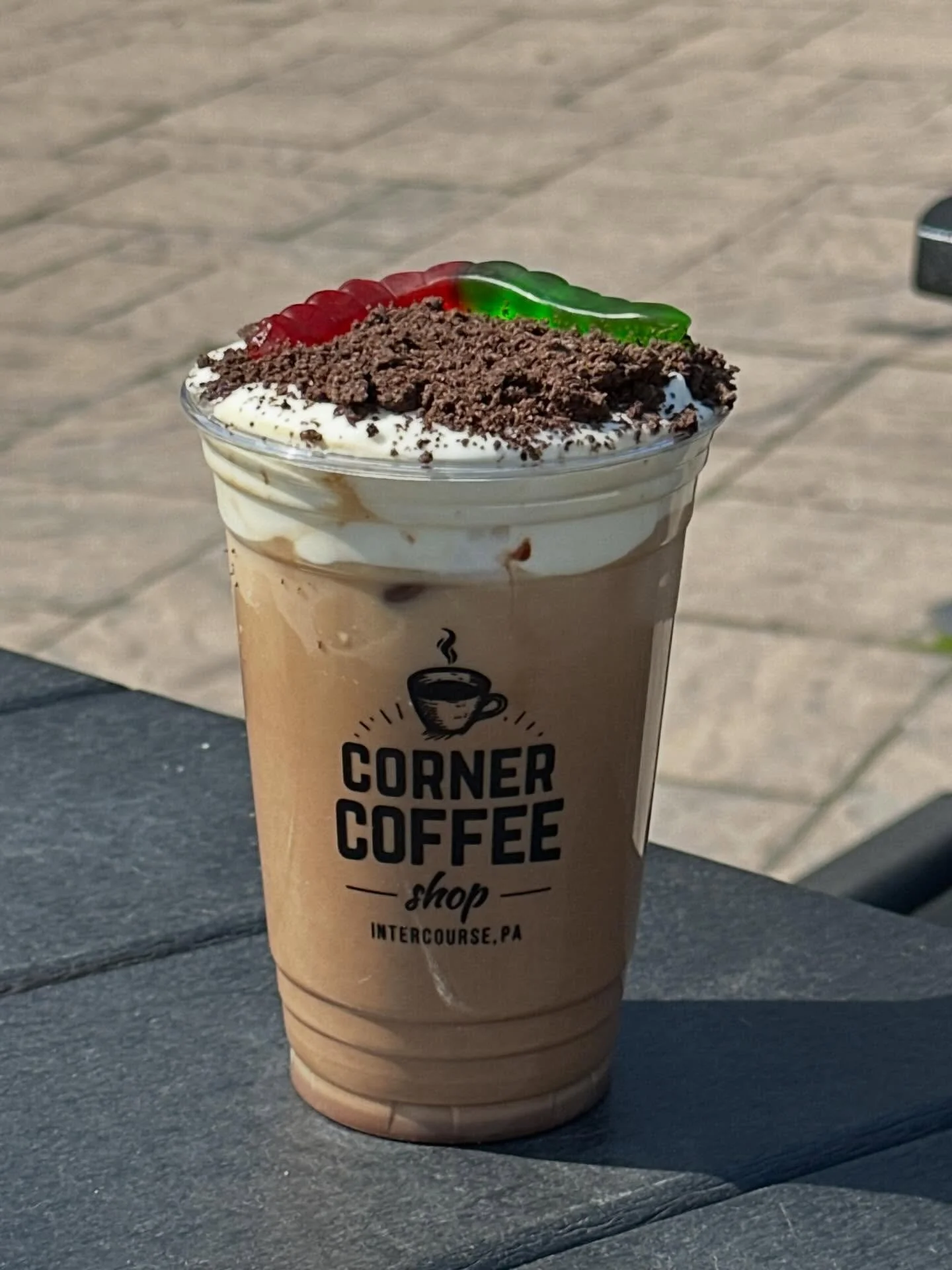 ☀️ It&rsquo;s the perfect sunny day to enjoy a Dirt Cake Latte in our courtyard. Soak up all the Spring beauty as you sip this deliciously fun drink! 

We are open 8am-6pm today.

#dirtcake #dirtcakelatte #icedlatte #gummyworm #intercoursepa