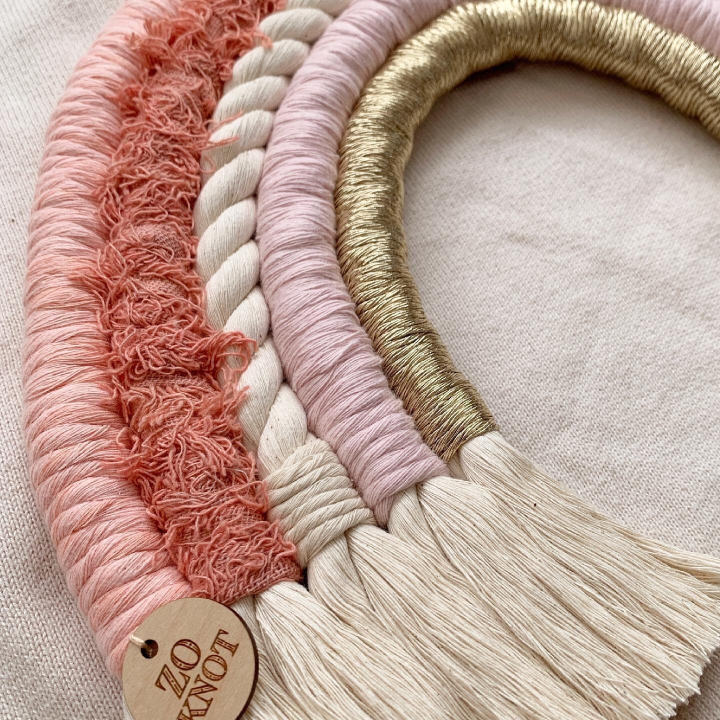 🌸SAKURA DELUXE RAINBOW🌸
.
Now available to order online! 
.
Inspired by the gentle cherry blossoms from my travels to Japan - this super sweet rainbow has all the texture &amp; detail!
.
@zo.knot  #zoknot #macrame #macramerainbow #macramerainbows #