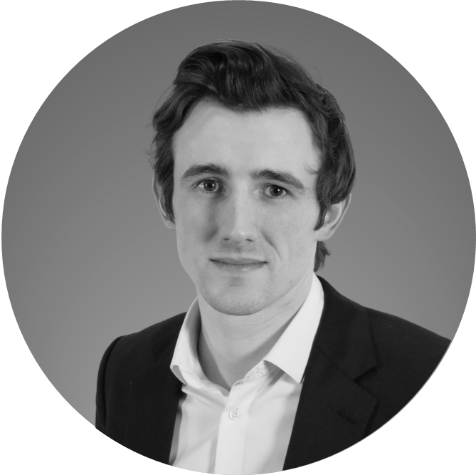 Black and white headshot of Christopher Breen.