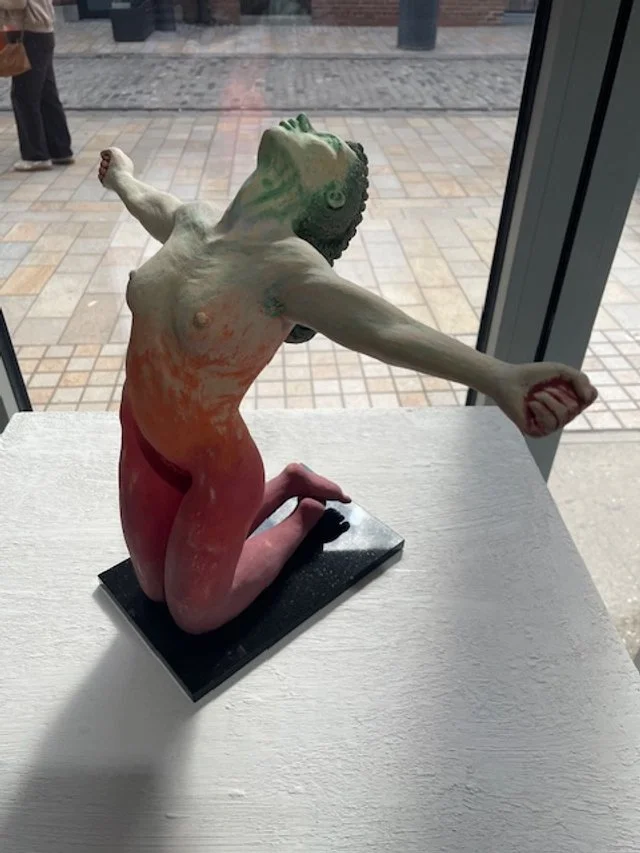 Lisa Wilson Kneeling Figure (front) 30cmH on granite base.JPG