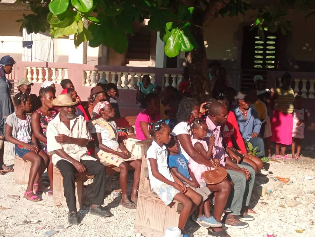 Patients waiting in courtyard.jpeg