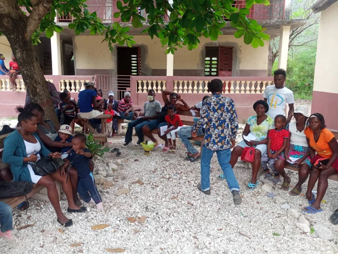 Many people from the surrounding area waited to see the doctors