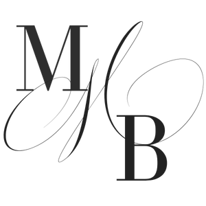 Elegant black script of the letters M, Y, B with decorative flourishes.