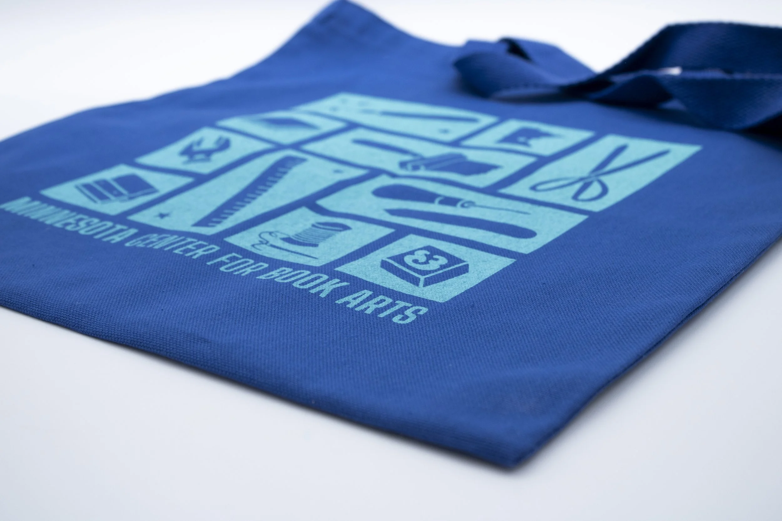 MCBA-MCBA-ToteBagMCBABookArtsStamps-01.jpg