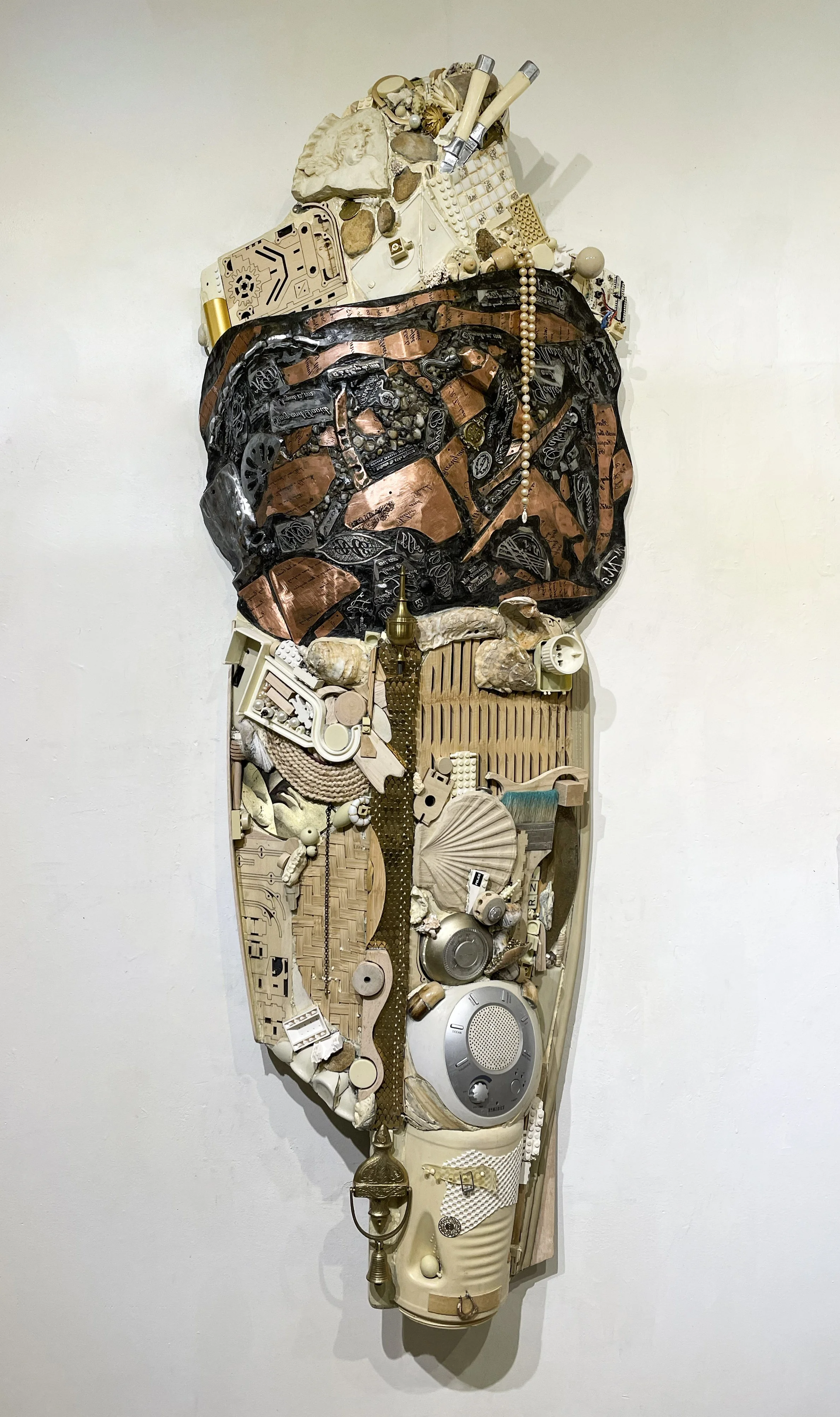   Beige Rarity 1295 
 2026; 52” x 20.5” x 5.5”; wood, metal, stone, shell, mixed media 