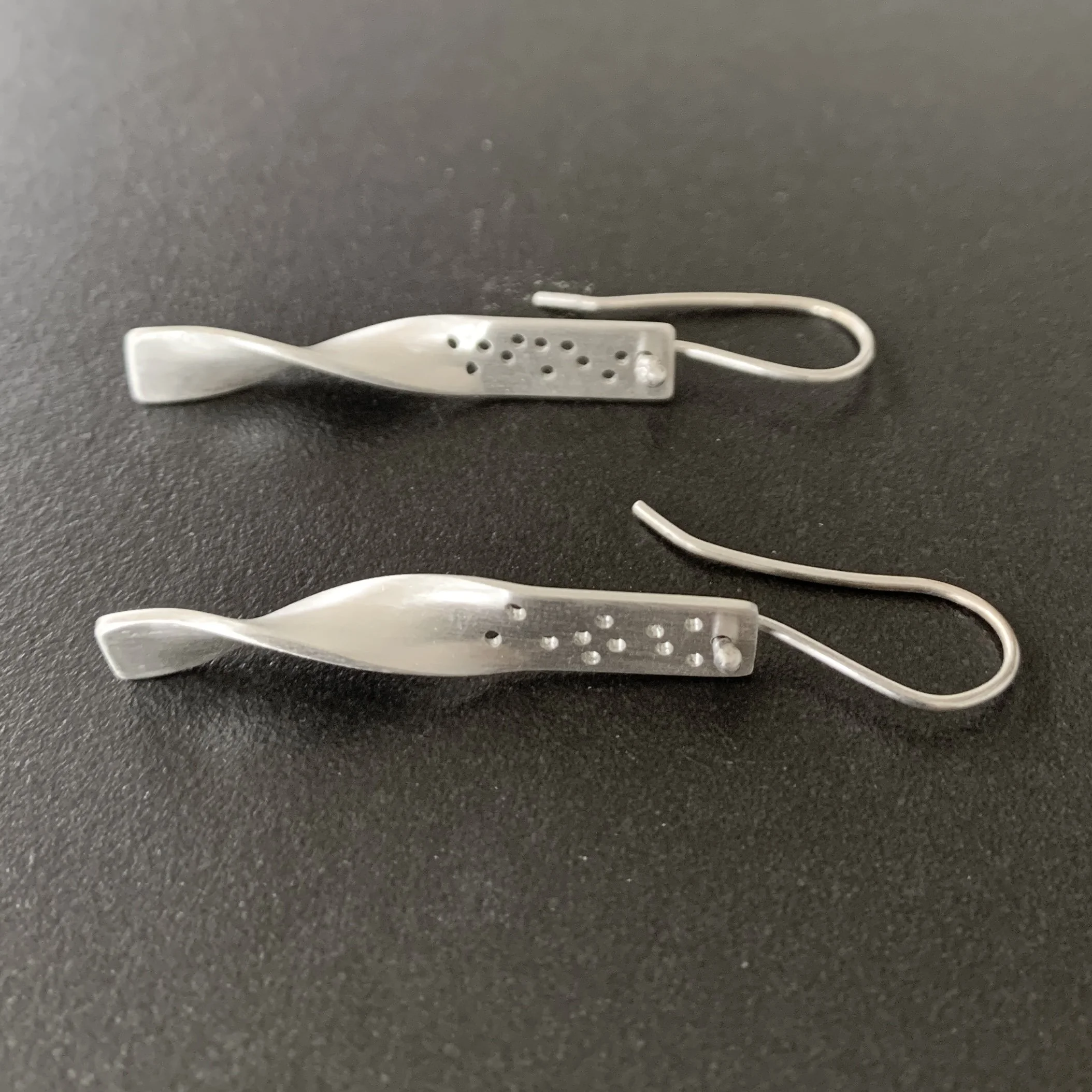 sterling silver perforated twist earring