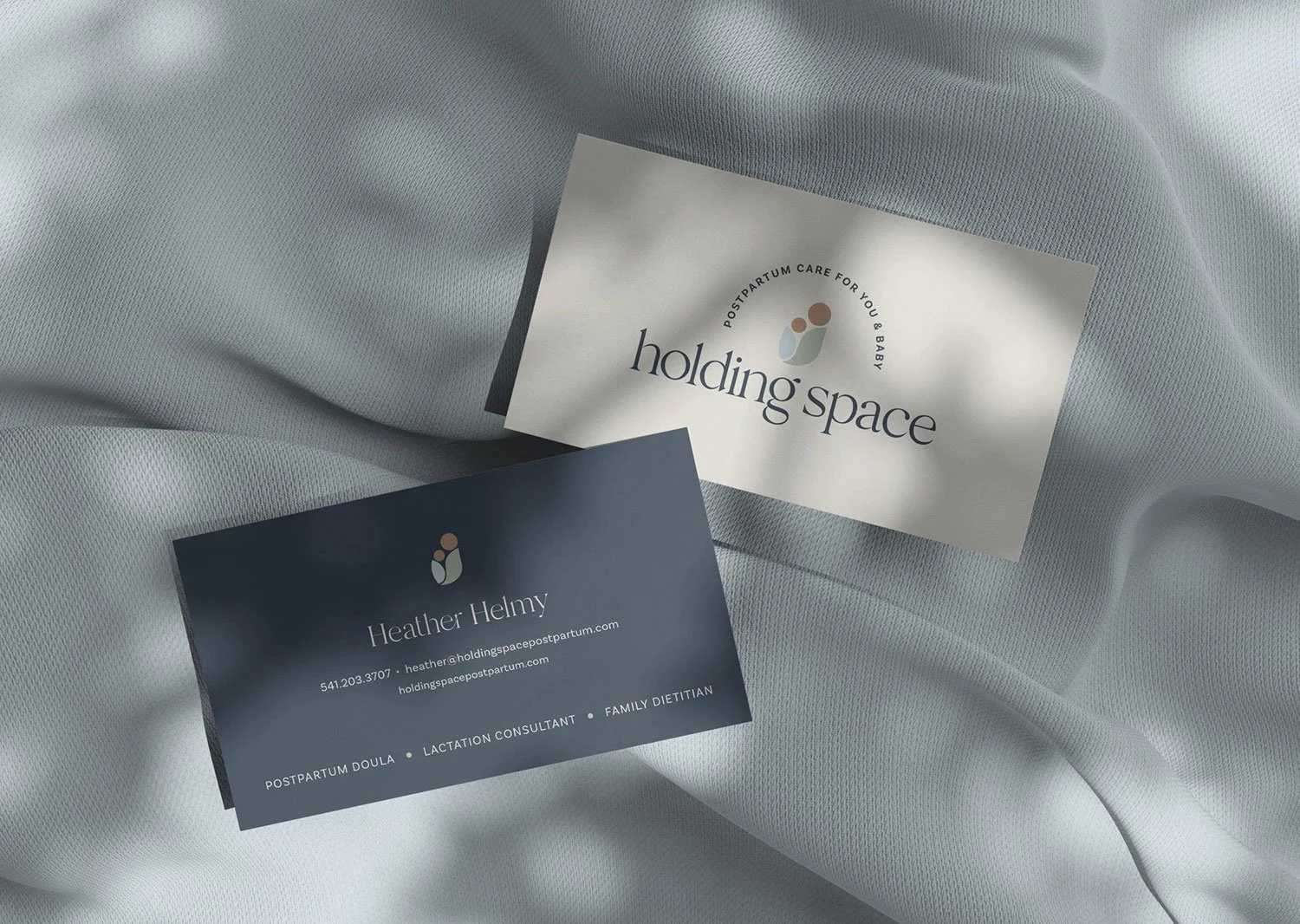 Custom business card design with logo, agave green color, and minimalist type for doula brand