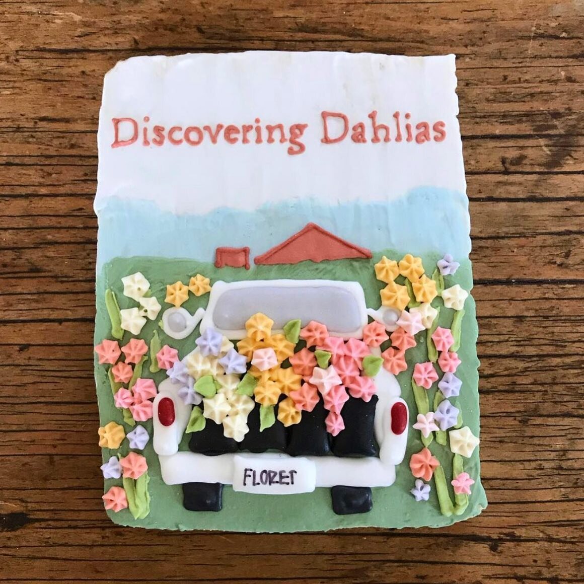 Can you believe this adorable cookie by @morgan_g_co in celebration of the publication of #discoveringdahlias? She creates the most beautiful confections for @floretflower book launches that match each cover! #wwllt @chroniclebooks #ittakesacommunity