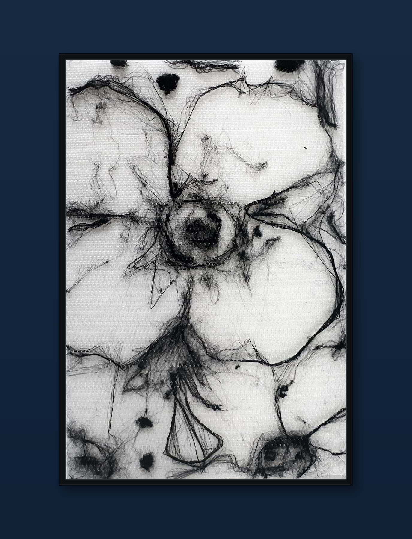 unity-puzzle-17-black-frame-navy-wall.png