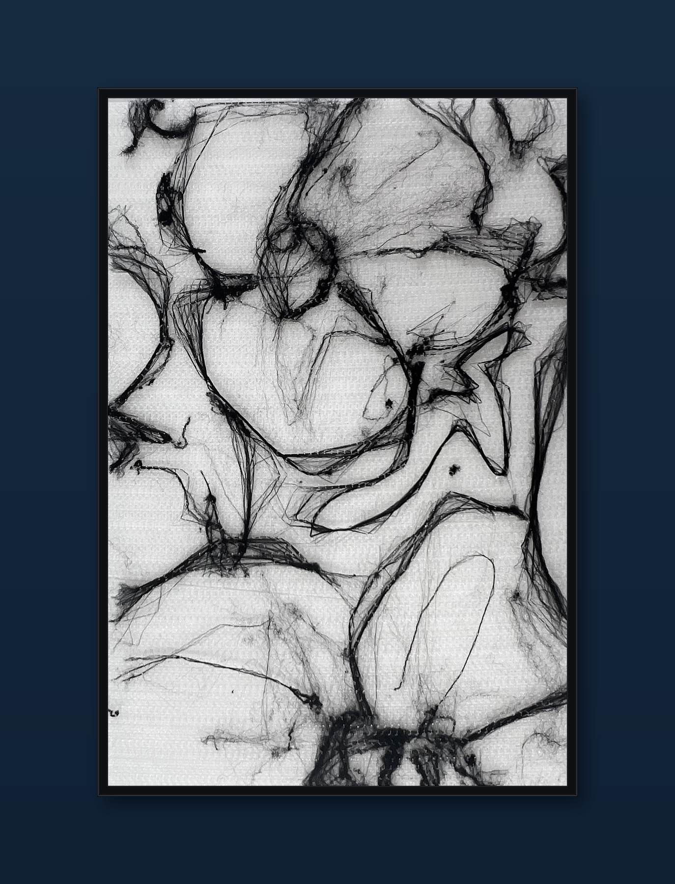 unity-puzzle-24-black-frame-navy-wall.png