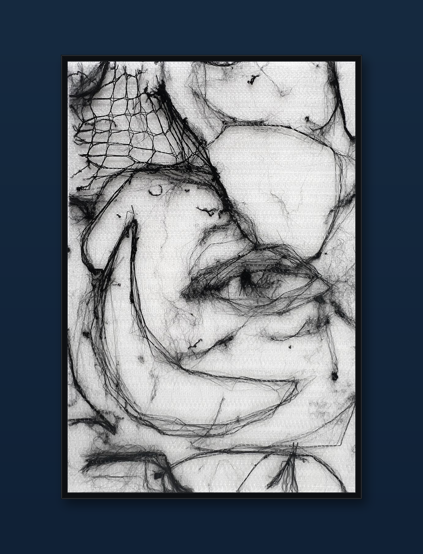 unity-puzzle-12-black-frame-navy-wall.png