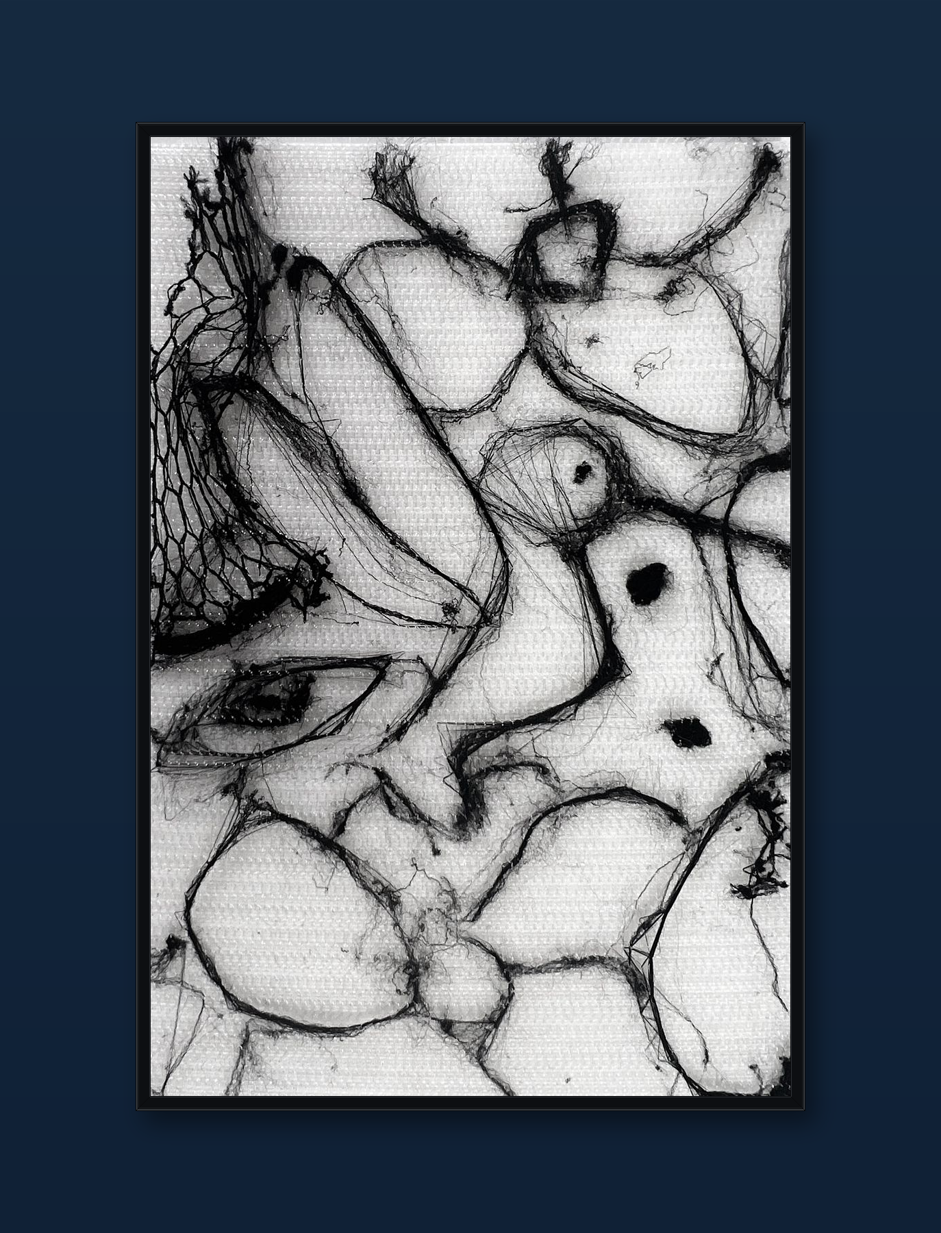 unity-puzzle-33-black-frame-navy-wall.png