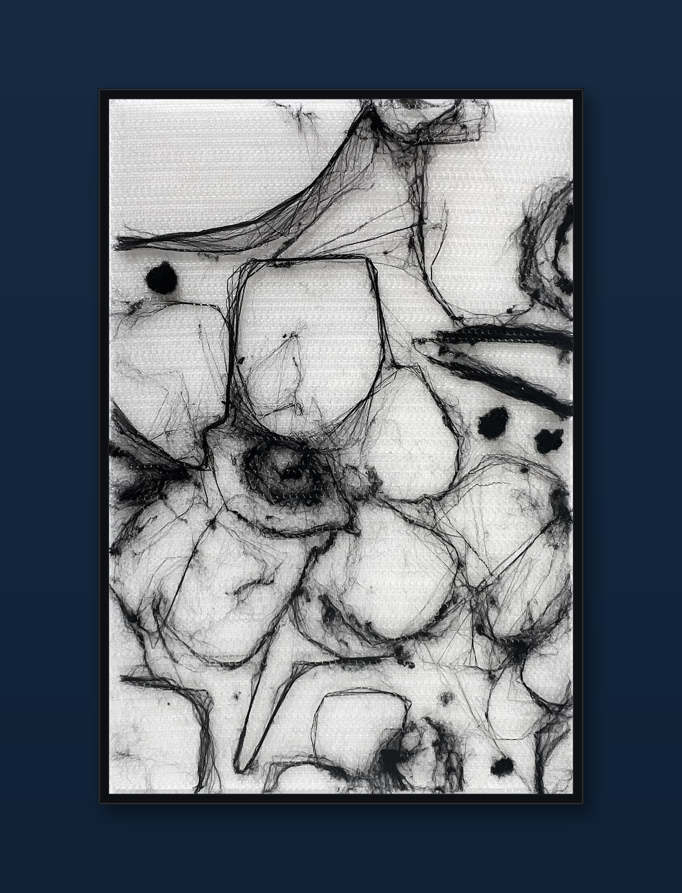 unity-puzzle-18-black-frame-navy-wall.png