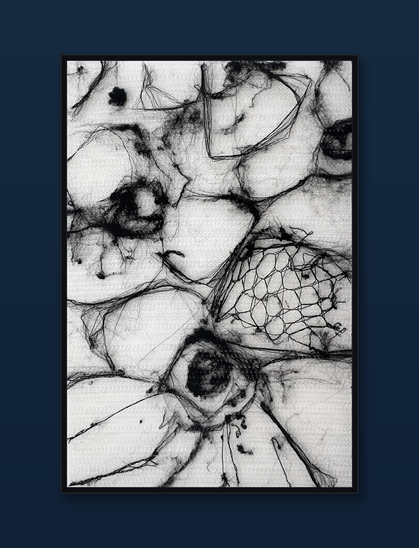 unity-puzzle-28-black-frame-navy-wall.png