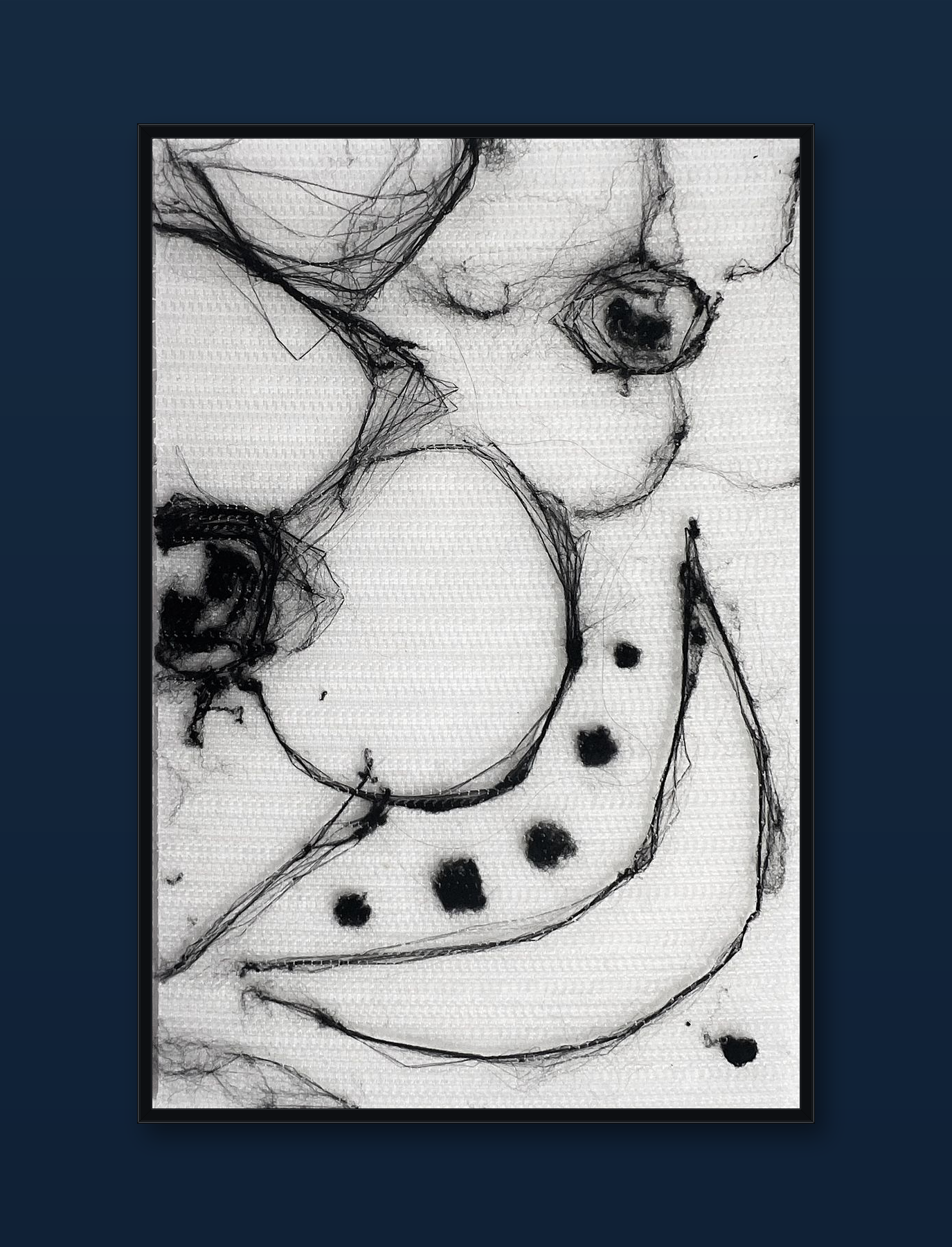 unity-puzzle-40-black-frame-navy-wall.png