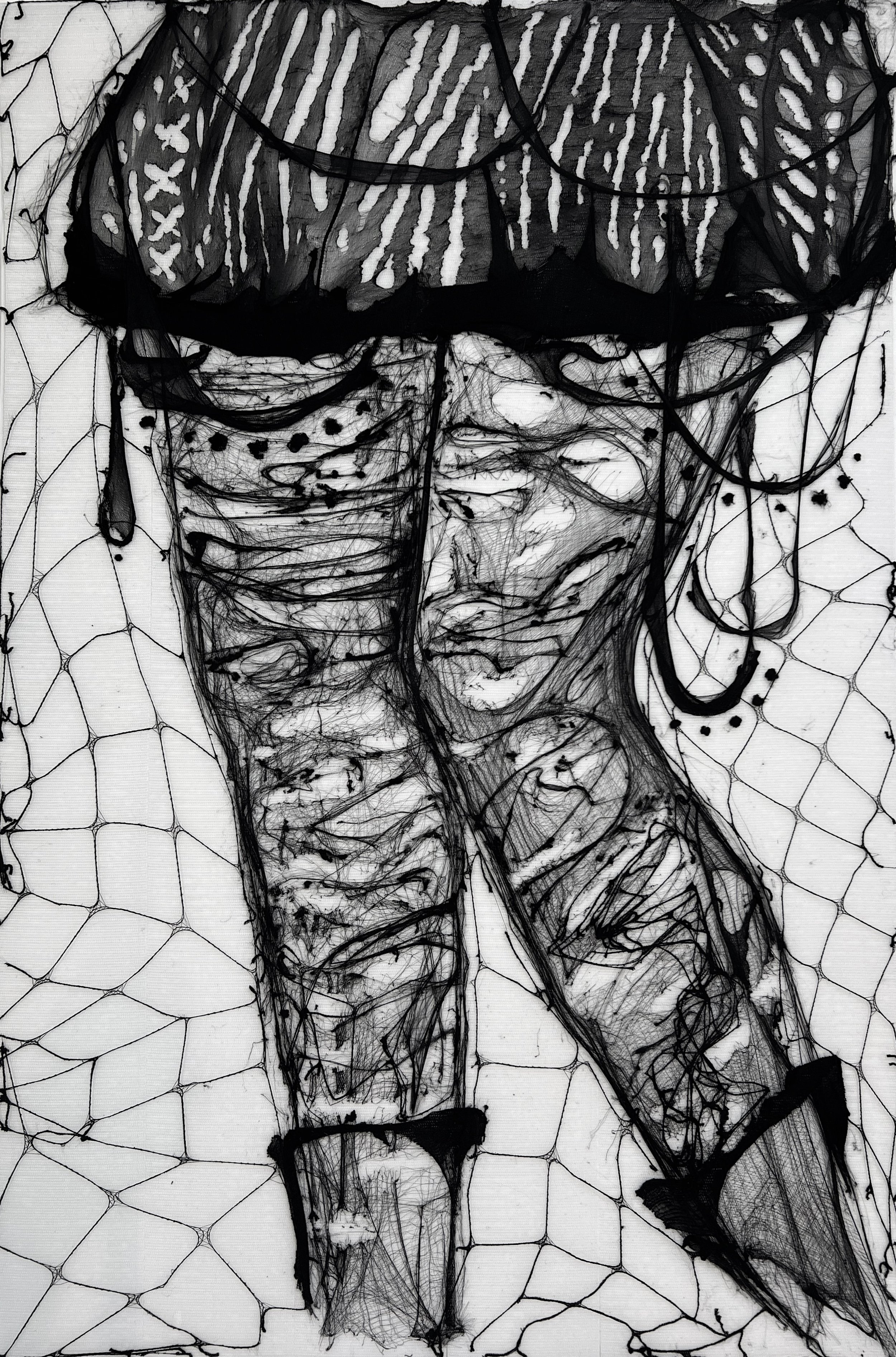 Black and white embroidered artwork of a woman with closed eyes, wearing a hat and jewelry, set against a background of a geometric pattern.