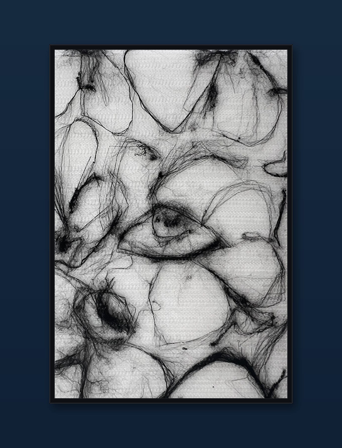 unity-puzzle-27-black-frame-navy-wall.png