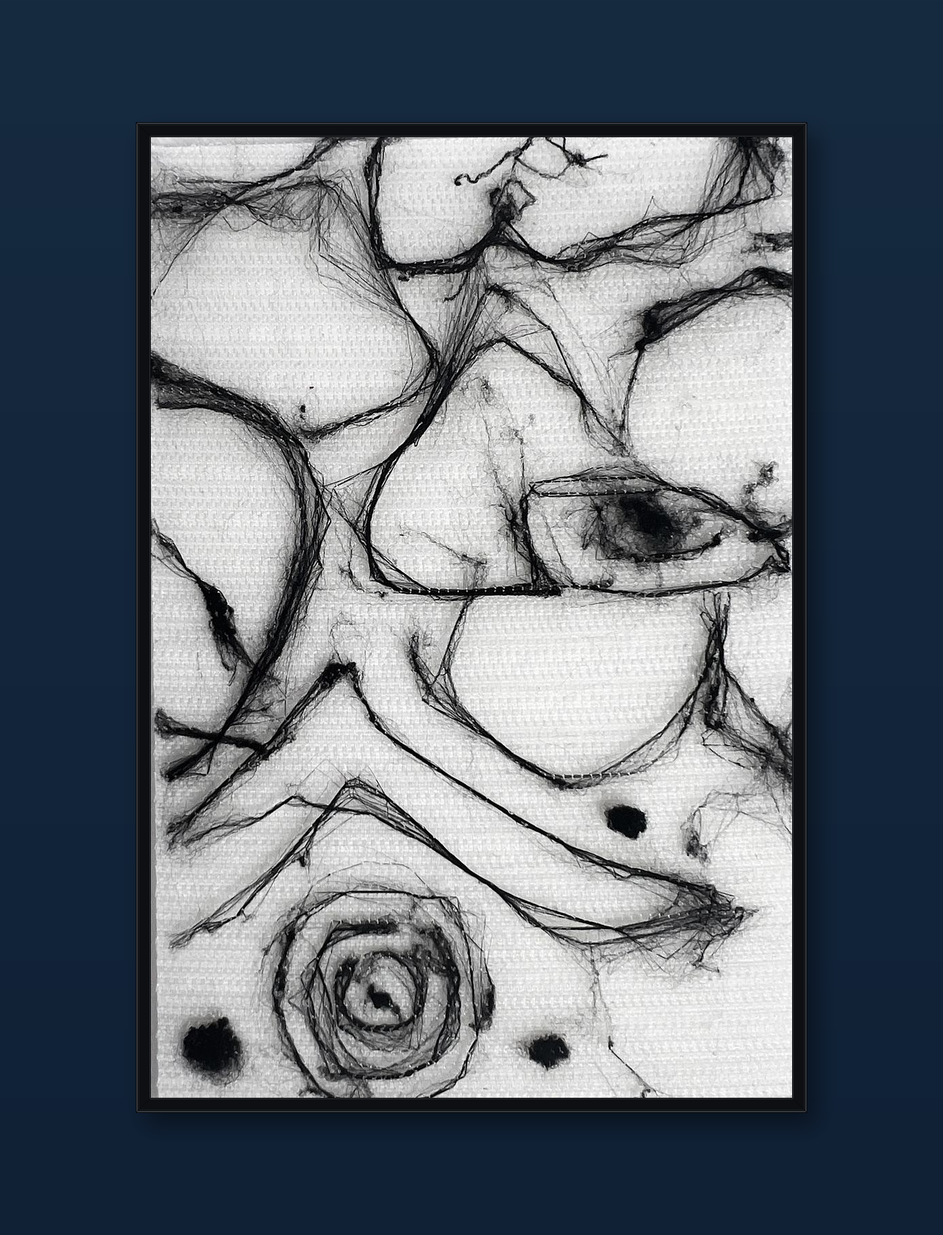 unity-puzzle-38-black-frame-navy-wall.png