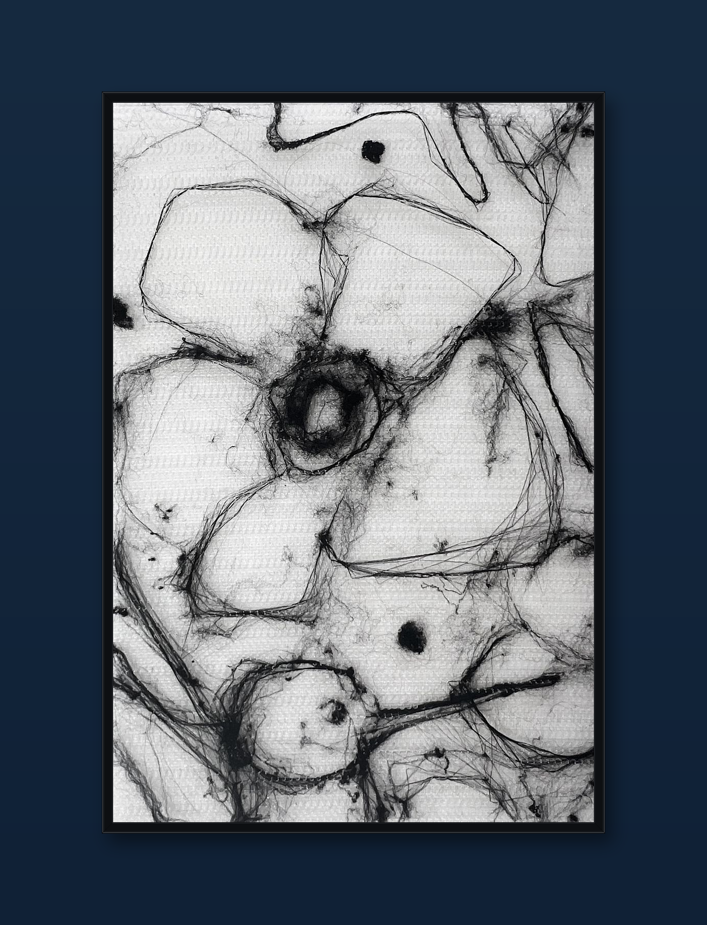 unity-puzzle-26-black-frame-navy-wall.png