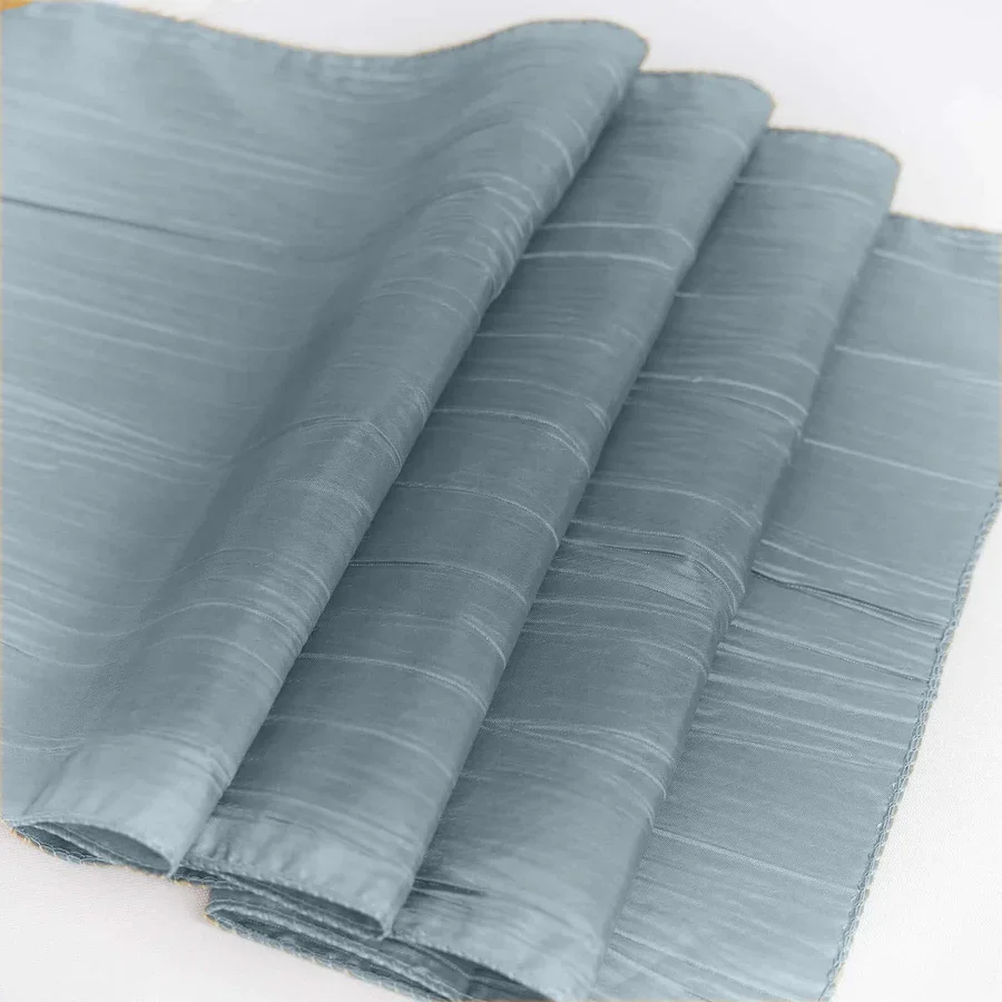dusty-blue-taffeta-table-runner-folded.webp