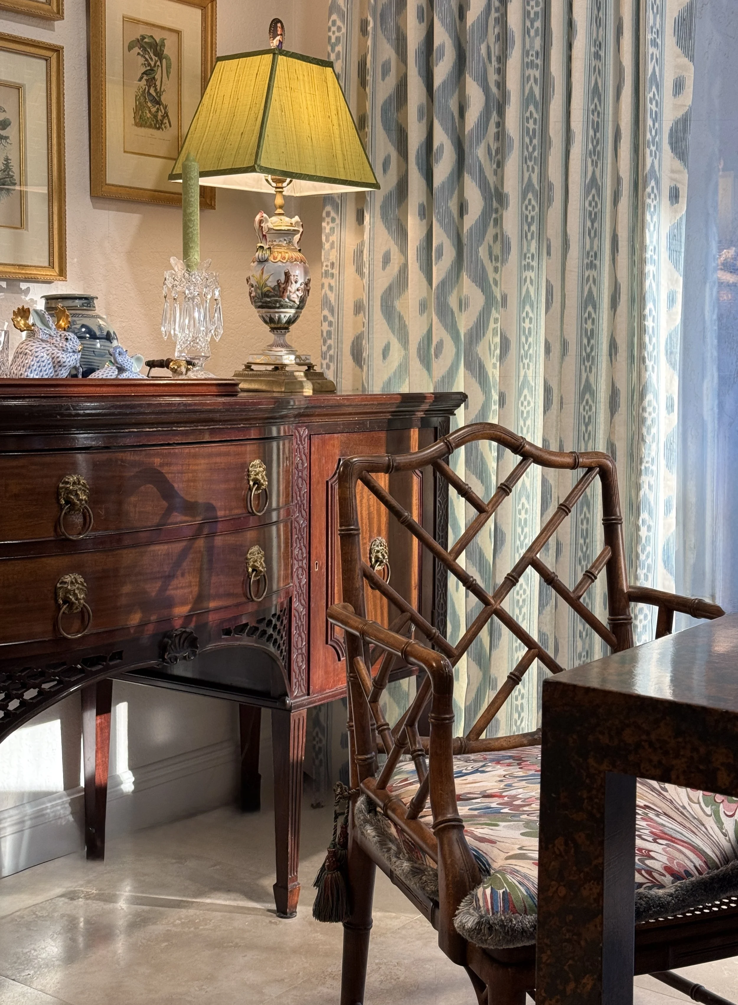 Dining Room with chippendale back chairs, antique sideboard, Pierre Frey drapery panels and Lee Jofa Taplow marbled cushions. 