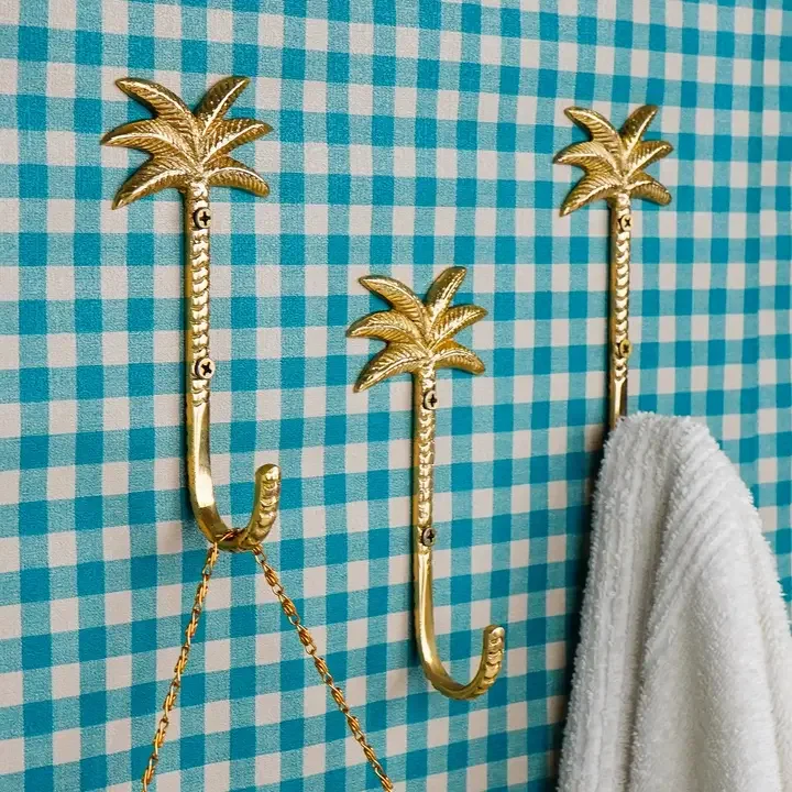 Faire brass palm hooks.webp