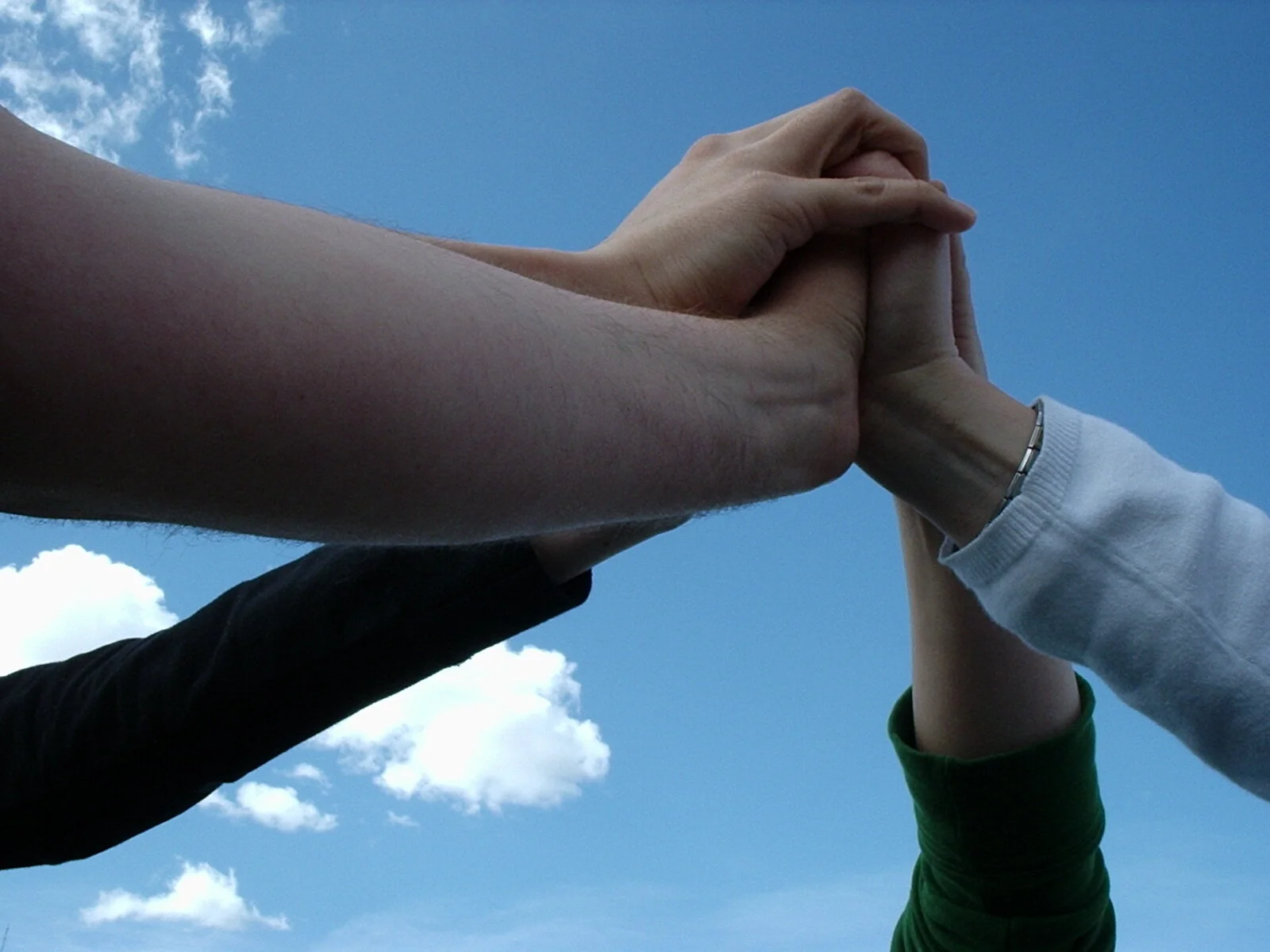 Team_touching_hands.jpg