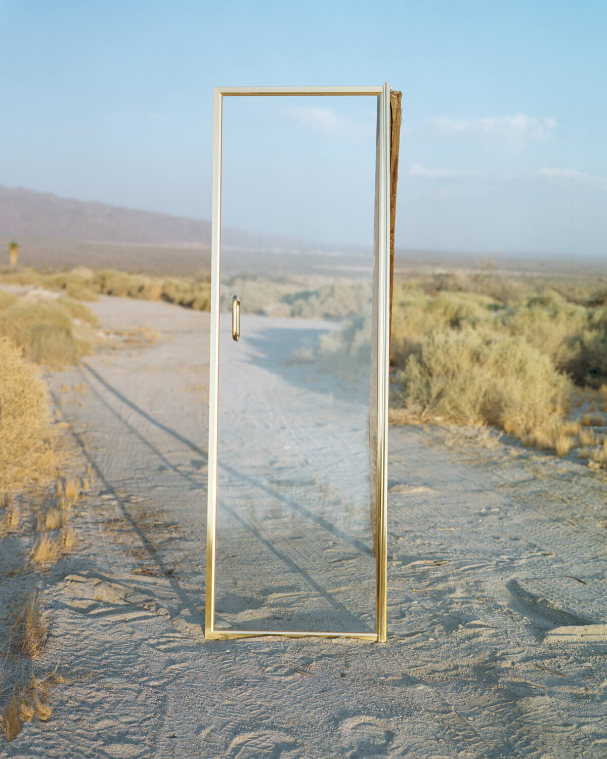  Glass Door, 2021 Archival pigment print   Writing    Film    Installation  