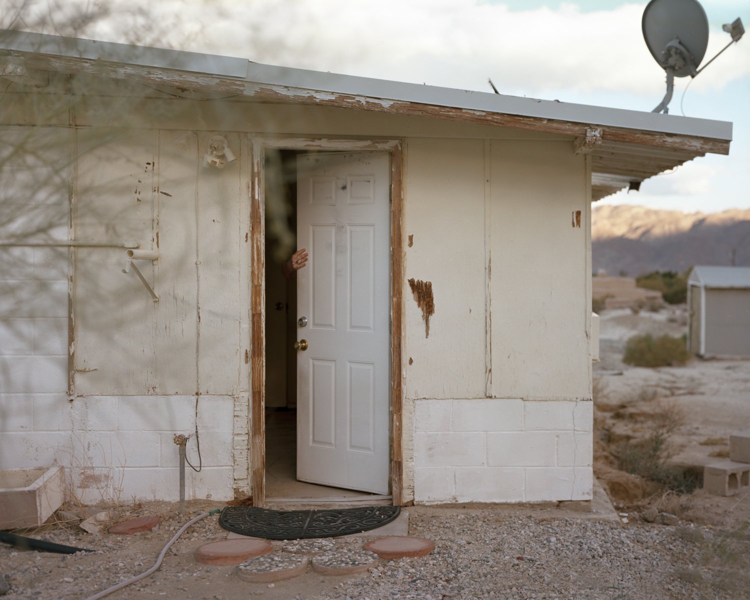  Hand on Door, 2023 Archival pigment print   Writing    Film    Installation  