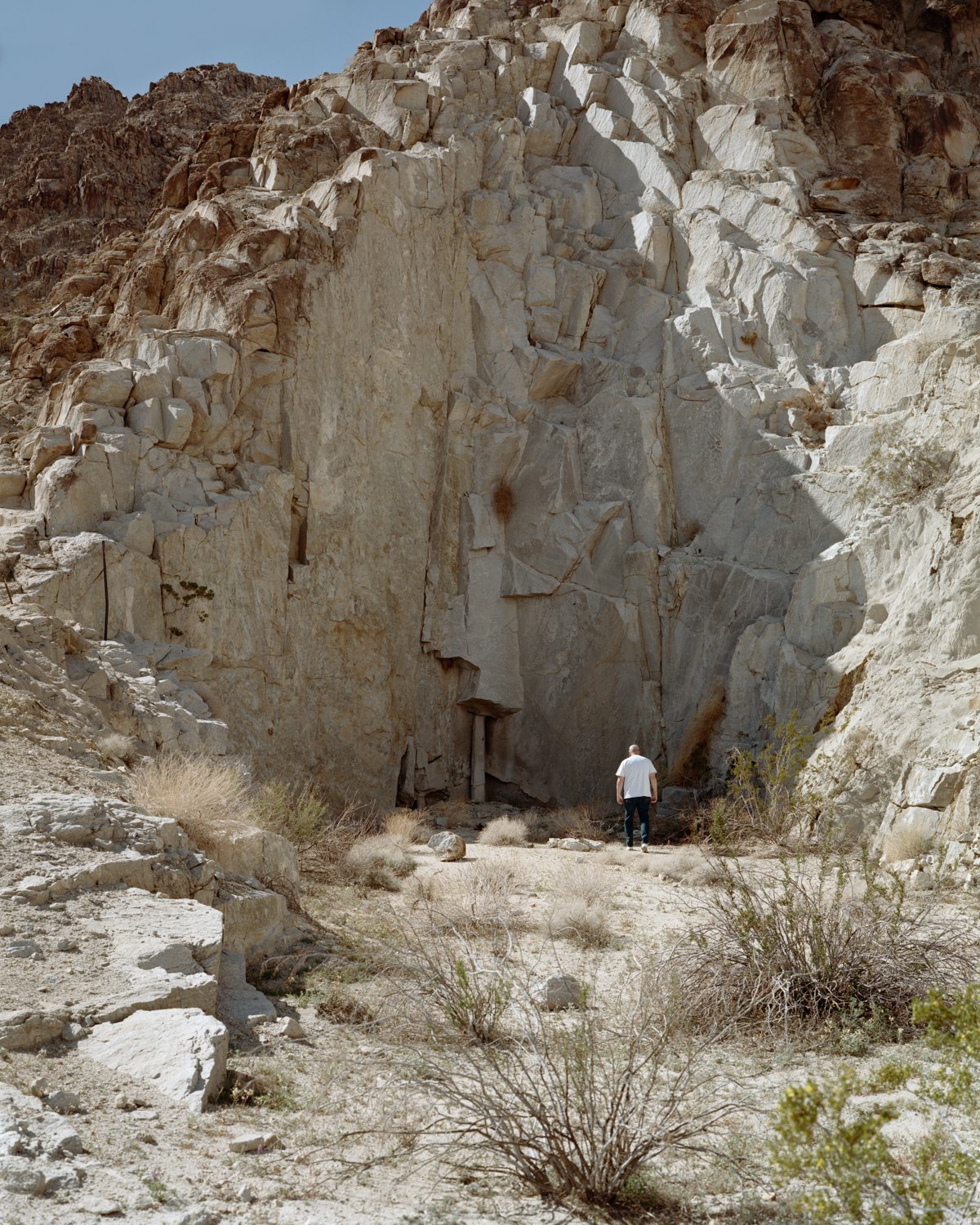  Man near Rock, 2023 Archival pigment print   Writing    Film    Installation  