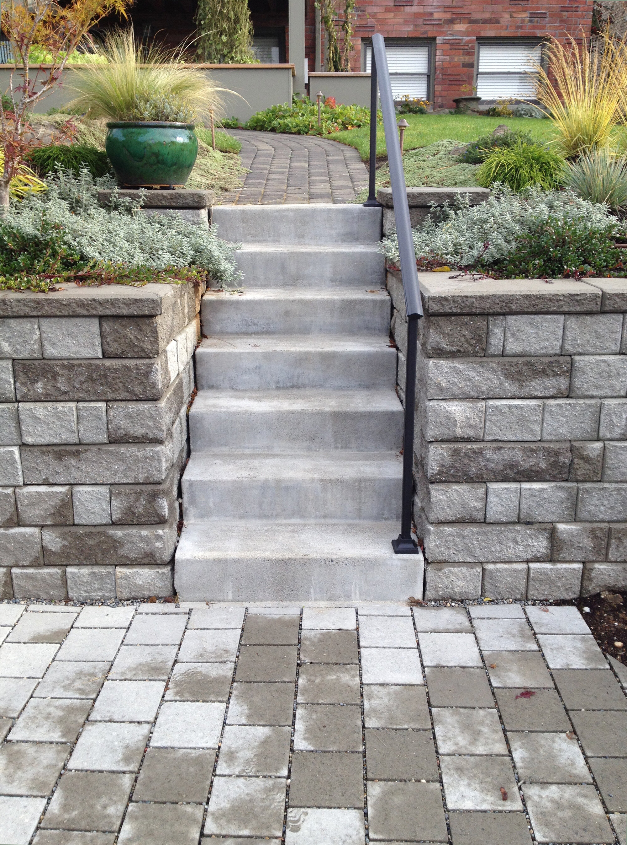 P2: Etched Concrete Steps with Custom Iron Railing