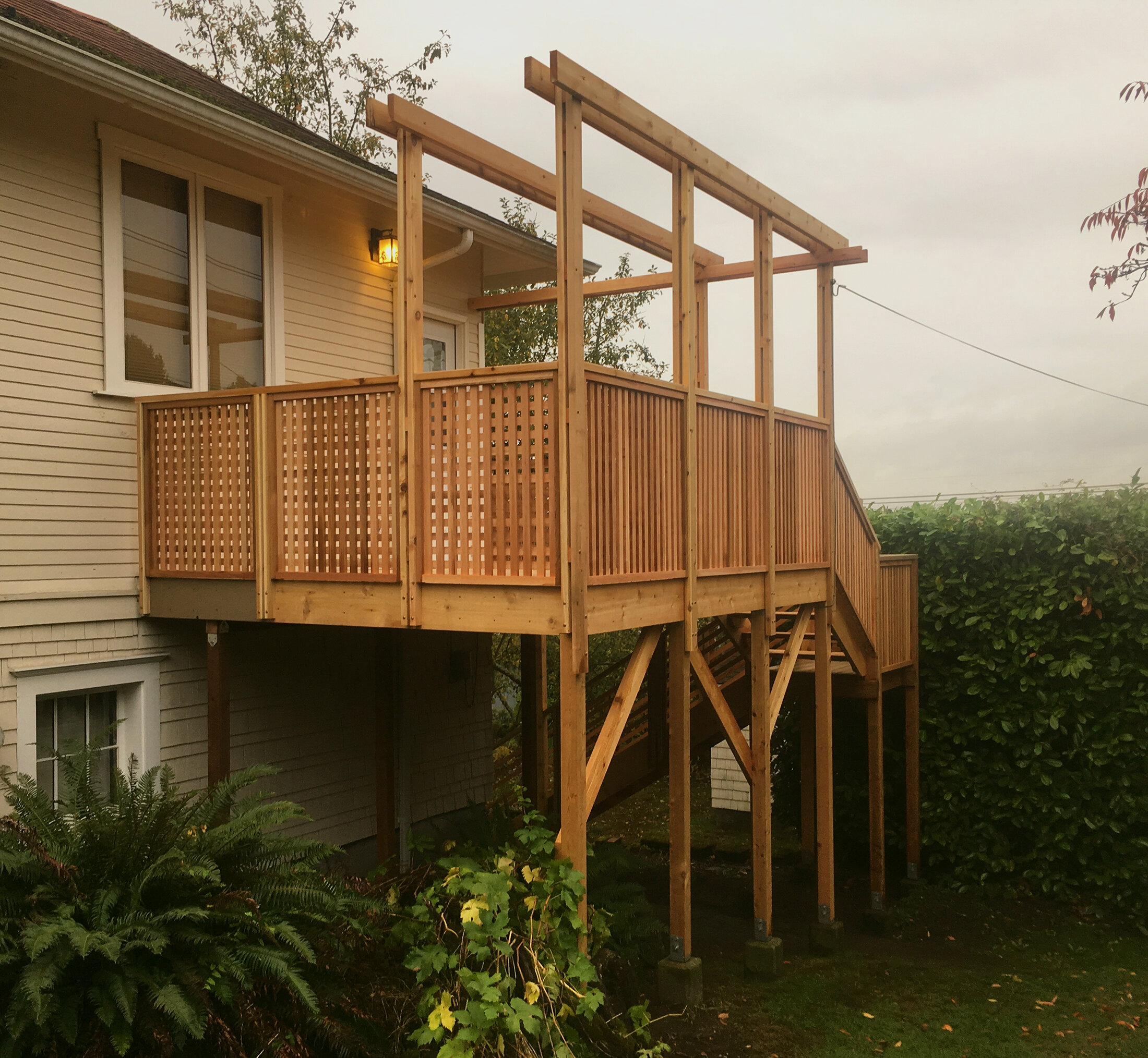 W5: 2nd Level Deck with Custom Lattice Railing and Wrapping Steps