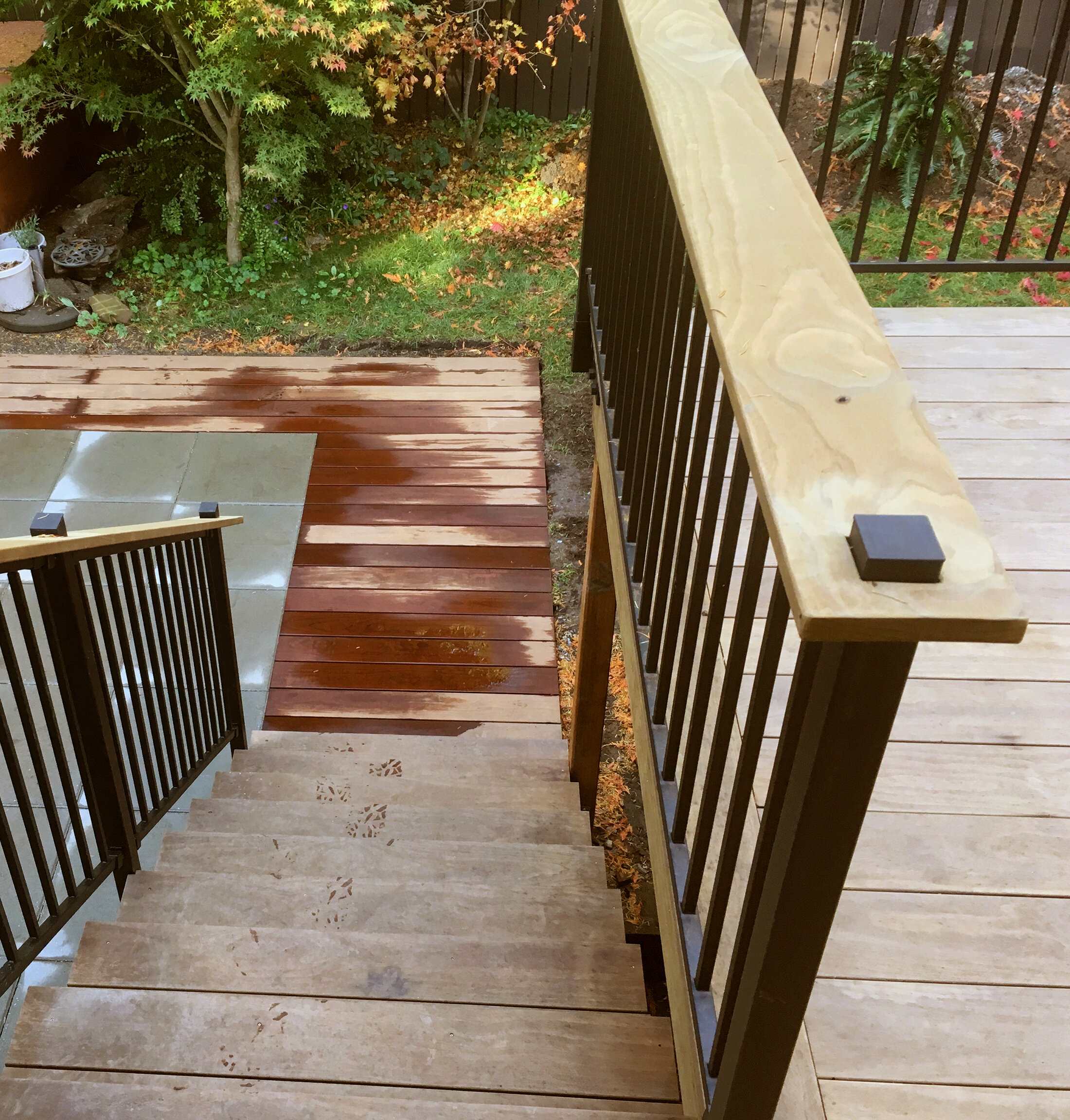 W24: Steps to Ground Level Deck Bordering Patio