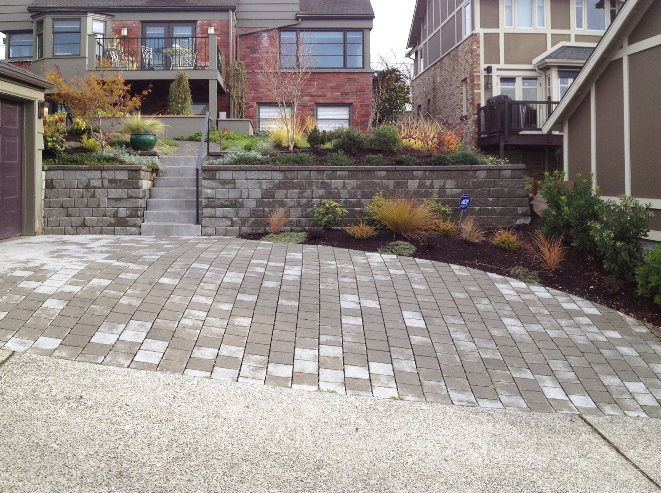 P1: CMU Retaining Wall and Etched Concrete Steps with Permeable Paver Driveway