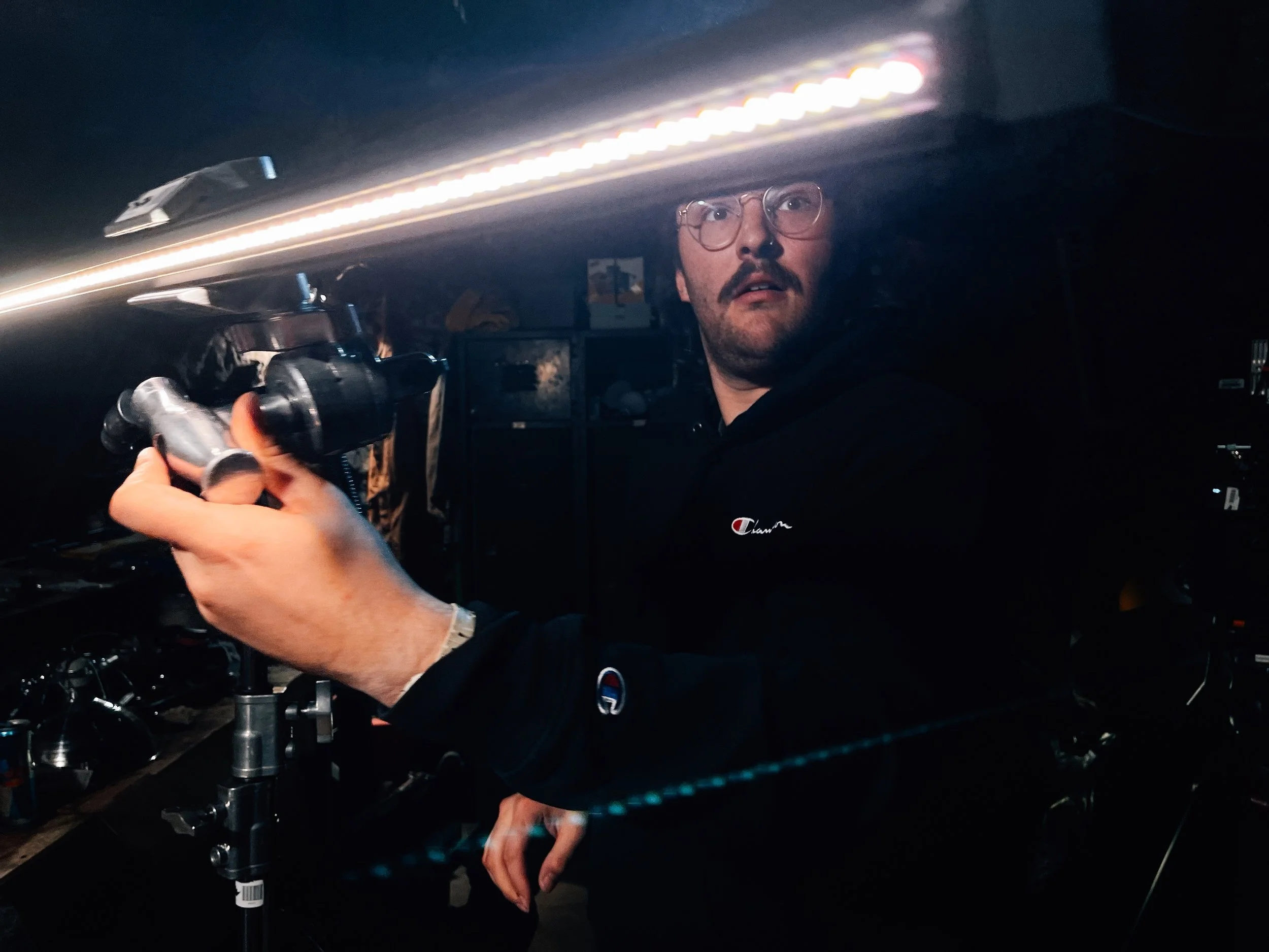 Gaffer Jake rigging the lights