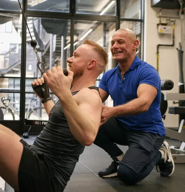 Omar Ryan personal trainer coaching a client at Oryan Fitness private gym Islington London
